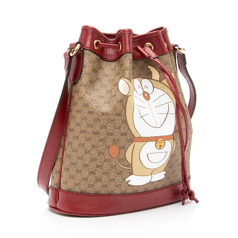 Ladies Gucci Dionysus bags in a pastel colorLadies Gucci Dionysus bags in a pastel colorGucci X Doraemon Micro GG Canvas Mini Bucket Bag (SHF-23366)