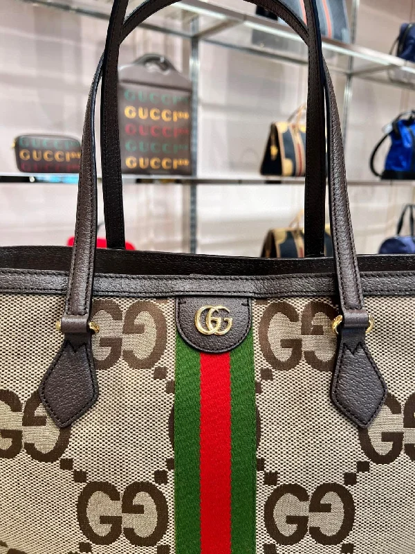 Women Gucci Sylvie bags with a detachable ribbon detailWomen Gucci Sylvie bags with a detachable ribbon detailPreOrder Gucci jumbo GG canvas tote