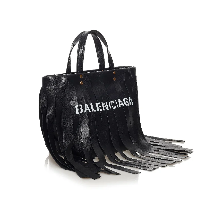 Balenciaga First medium size with gold - tone hardware accentsWhiteBalenciaga City bag with patchwork of different leathersBalenciaga Laundry Cabas Fringe Leather Tote Bag (SHG-33746)