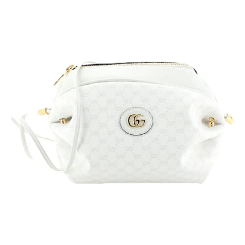 Gucci handbags for women with a beaded trimGucci handbags for women with a beaded trimGucci Mini GG Candy White Crossbody Bag