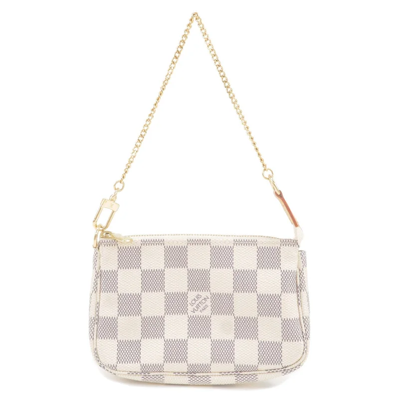 Louis Vuitton Twist bags with the iconic LV - turnlock closureLouis Vuitton Damier Azur Mini Pochette Accessoires Pouch N58010