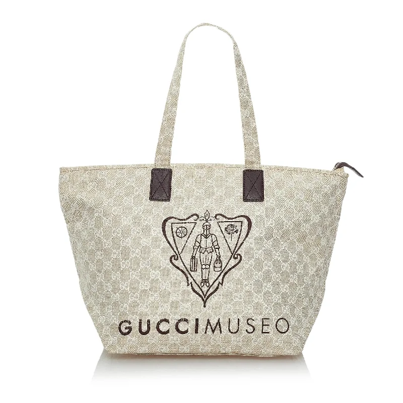 Women Gucci bags with a detachable mirror insideWomen Gucci bags with a detachable mirror insideGucci GG Canvas Museo Tote Bag