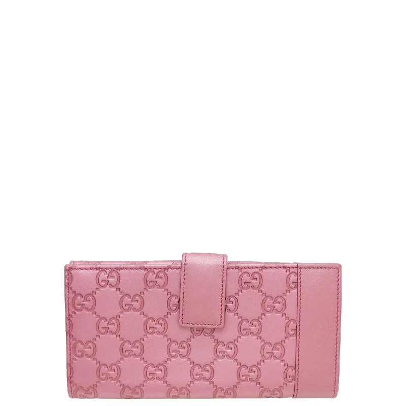 Ladies Gucci Dionysus bags in a pastel colorLadies Gucci Dionysus bags in a pastel colorGucci Metallic Pink Guccissima Heart Charm Continental Wallet