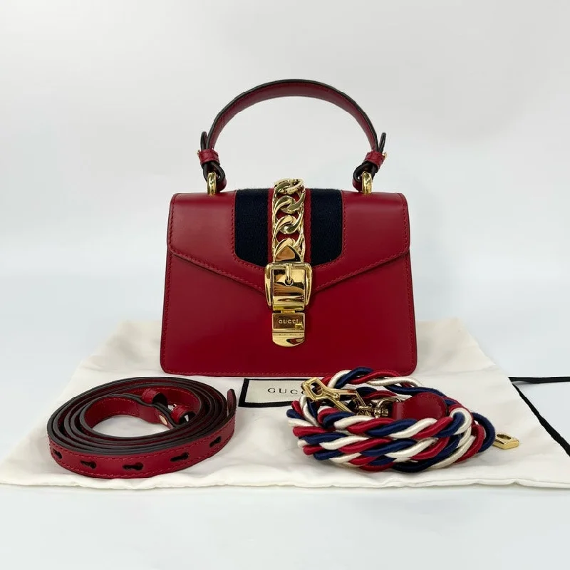 Gucci handbags for women with a patent - leather finishGucci handbags for women with a patent - leather finishGucci Sylvie Red Leather Gold Chain Strap Bag Small 20x14cm