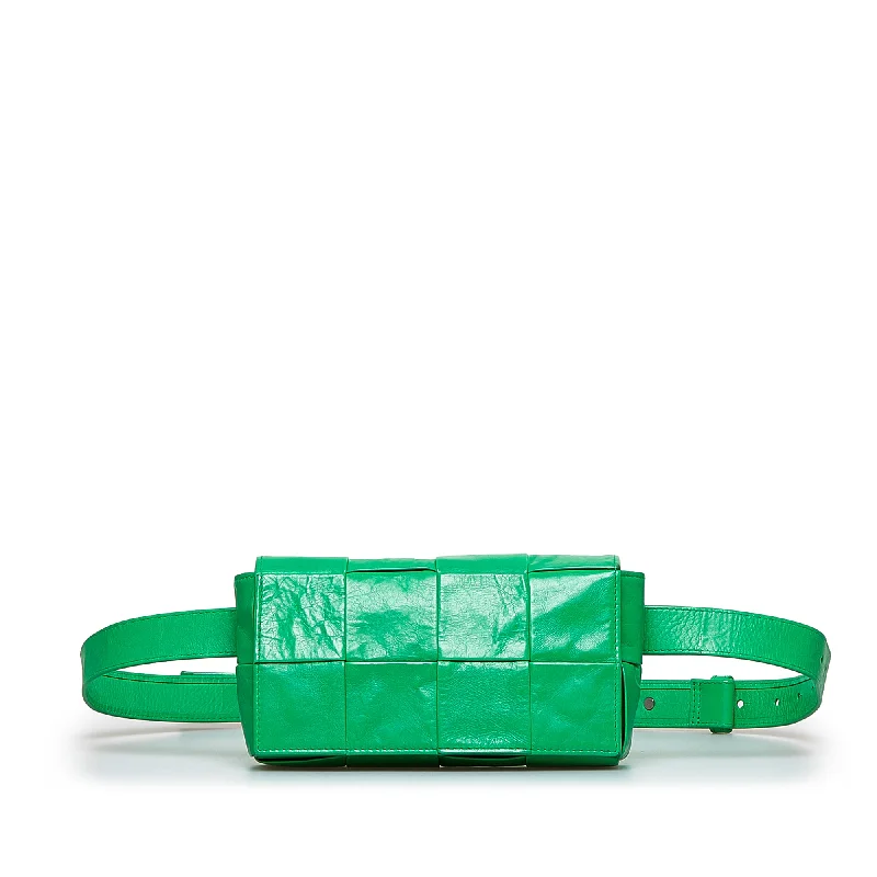 	Balenciaga First small size with silver - tone rivetsGreen Bottega Veneta Mini Nappa Intrecciato Cassette Belt Bag