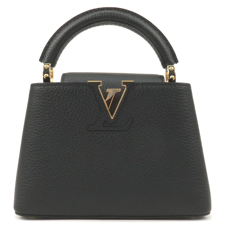 Louis Vuitton Twist bags with a contrast - colored interior for visual interestLouis Vuitton Capucines Mini 2Way Bag Hand Bag Black M56071