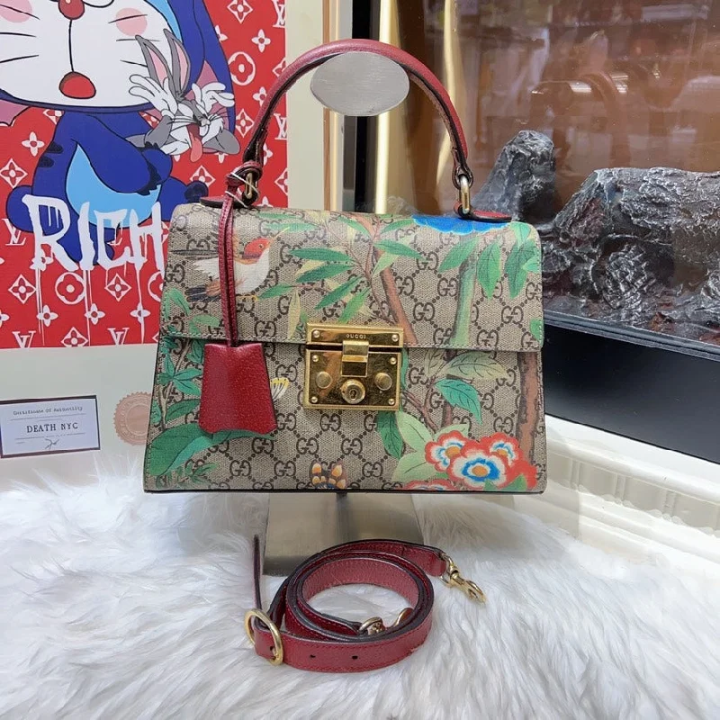 Ladies Gucci shoulder bags with a tassel decorationLadies Gucci shoulder bags with a tassel decorationGucci Tian GG Supreme Floral Print Padlock Bag Small Brown Multicolor