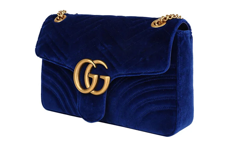 Women Gucci bags with a snap - button closure and a decorative charmWomen Gucci bags with a snap - button closure and a decorative charmGUCCI GG Marmont Gold Label Logo Distress Velvet Chain Shoulder Messenger Bag Navy Blue 443496-K4D2T-4511