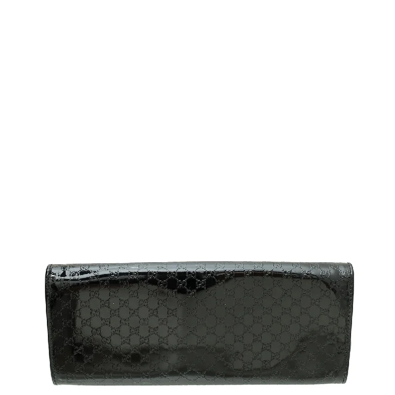 Women Gucci bags with interlocking G hardware for a classic lookWomen Gucci bags with interlocking G hardware for a classic lookGucci Black GG Microguccissima Broadway Clutch