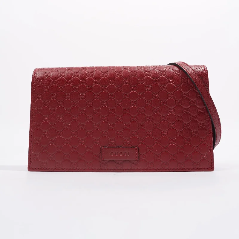 Women Gucci Sylvie bags with a monogram - embossed leatherWomen Gucci Sylvie bags with a monogram - embossed leatherGucci Womens Micro Guccissima Flap Crossbody Red Leather