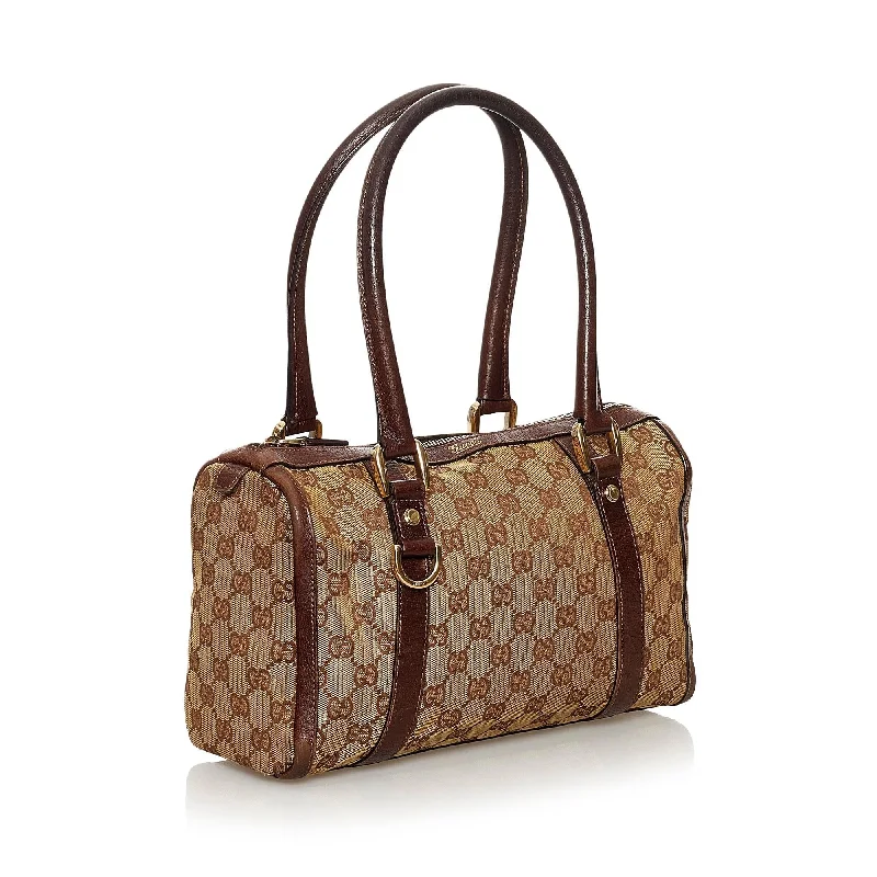 Women Gucci Sylvie bags with a monogram - embossed leatherWomen Gucci Sylvie bags with a monogram - embossed leatherGucci GG Canvas Abbey Boston Bag (30048)