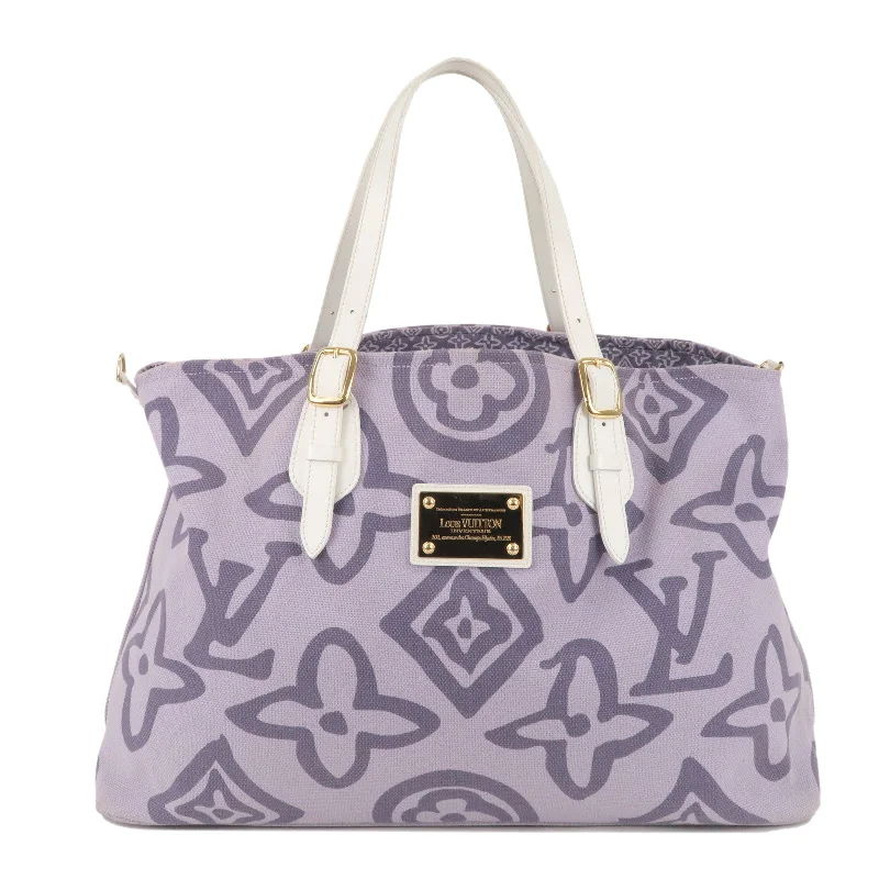 Louis Vuitton Alma bags featuring the signature top - handle designLouis Vuitton Cruise Line Tishenne GM Shoulder Bag Lilas M95681