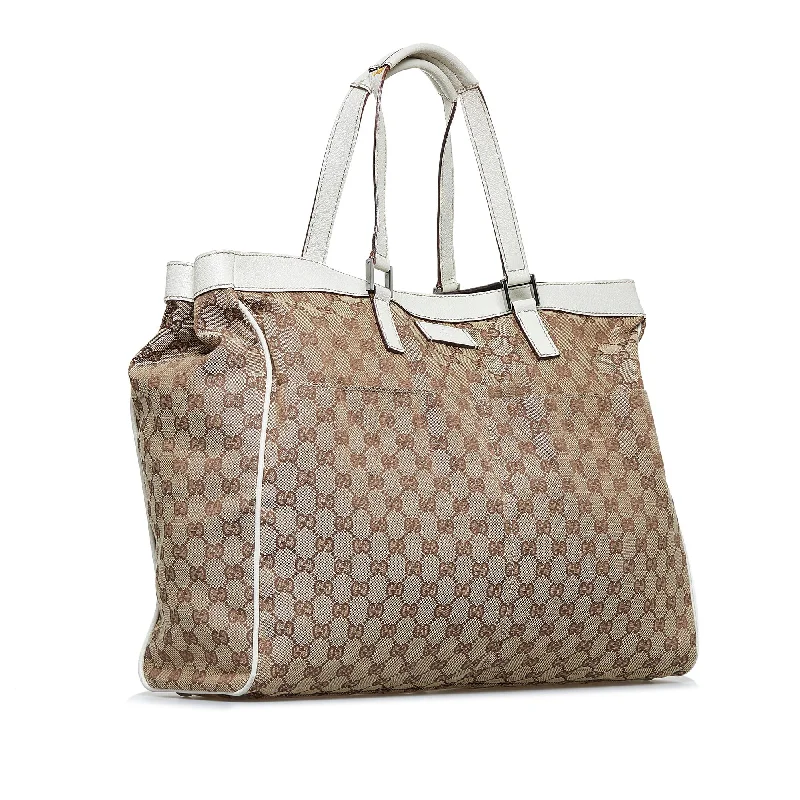 Women Gucci Sylvie bags with a monogram - embossed leatherWomen Gucci Sylvie bags with a monogram - embossed leatherGucci GG Canvas Tote (SHG-4HWOKn)