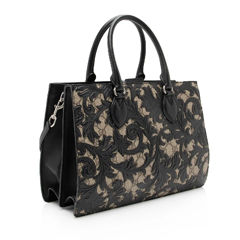 Ladies Gucci Dionysus bags with a chain - link shoulder strapLadies Gucci Dionysus bags with a chain - link shoulder strapGucci GG Supreme Arabesque Top Handle Convertible Small Tote (SHF-23364)