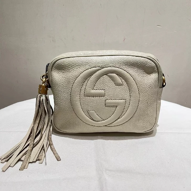 Ladies Gucci shoulder bags with a magnetic - closure flapLadies Gucci shoulder bags with a magnetic - closure flapGucci Soho Disco White Leather Crossbody Bag