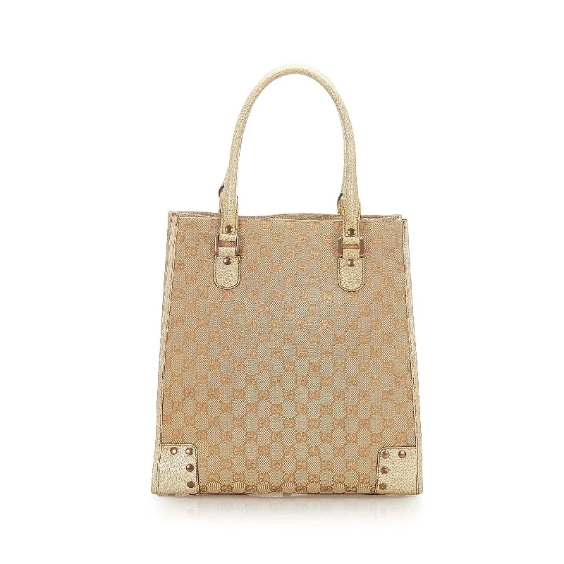 Women Gucci bags with a magnetic snap closure for easy accessWomen Gucci bags with a magnetic snap closure for easy accessGucci GG Canvas Tote Bag (SHG-17666)