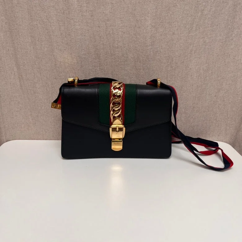 Ladies Gucci Dionysus bags with a star - shaped charmLadies Gucci Dionysus bags with a star - shaped charmGucci Sylvie Black Leather Top Handle Bag Medium Size