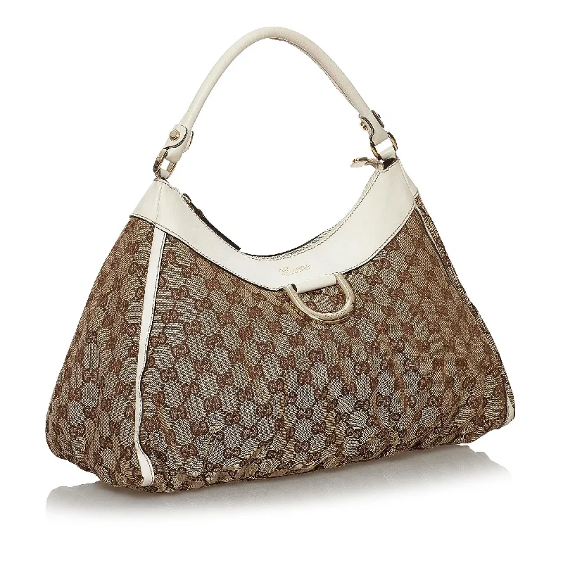 Women Gucci bags with interlocking G hardware for a classic lookWomen Gucci bags with interlocking G hardware for a classic lookGucci GG Canvas Abbey D-Ring Shoulder Bag (30184)