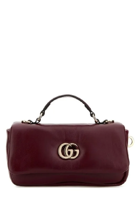 Women Gucci bags with a zippered interior pocketWomen Gucci bags with a zippered interior pocketGucci Women Burgundy Leather Handbag