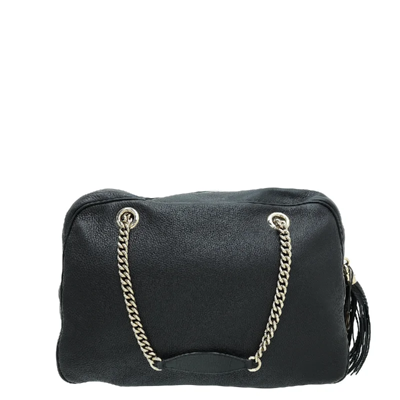 Women Gucci bags with a snap - button closure and a decorative charmWomen Gucci bags with a snap - button closure and a decorative charmGucci Black Soho Tassel Chain Large Shoulder Bag