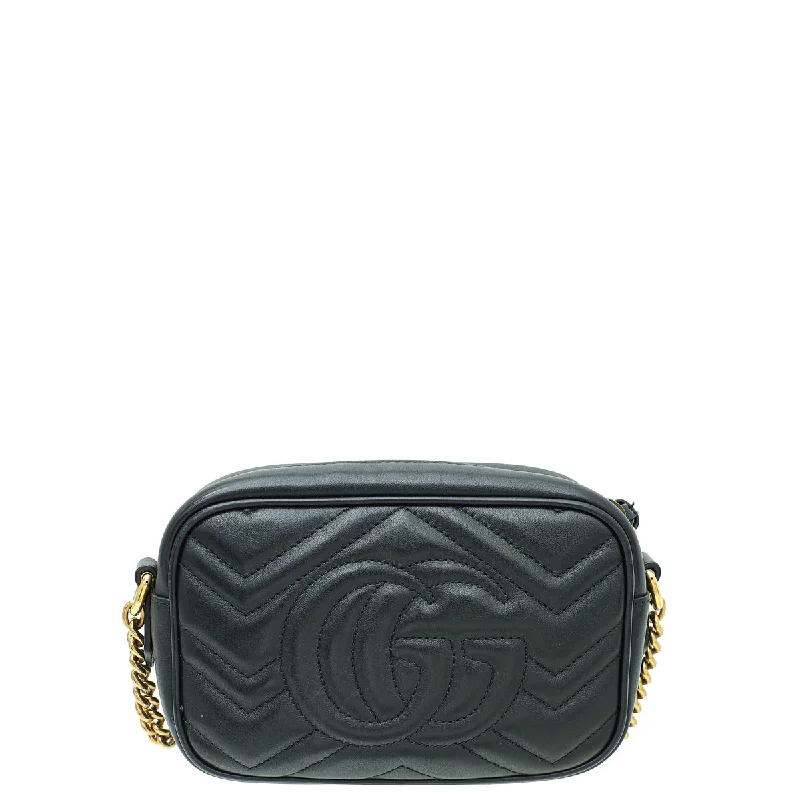 Women Gucci Sylvie bags with a monogram - embossed leatherWomen Gucci Sylvie bags with a monogram - embossed leatherGucci Black GG Marmont Mini Camera Bag