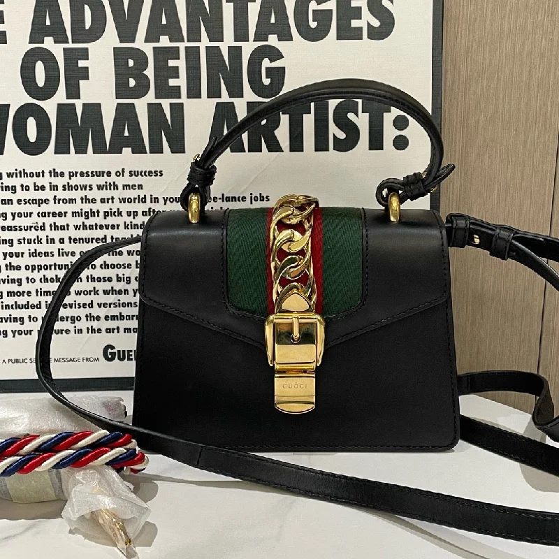 Gucci tote bags for women with a printed Gucci logoGucci tote bags for women with a printed Gucci logoGucci Sylvie Black Leather Green Red Web Small Shoulder Bag