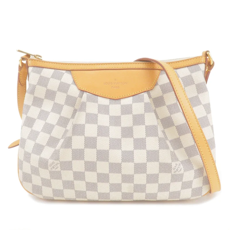 Louis Vuitton bags with a front - zip pocket for small items like keysLouis Vuitton Damier Azur Siracusa PM Shoulder Bag N41113