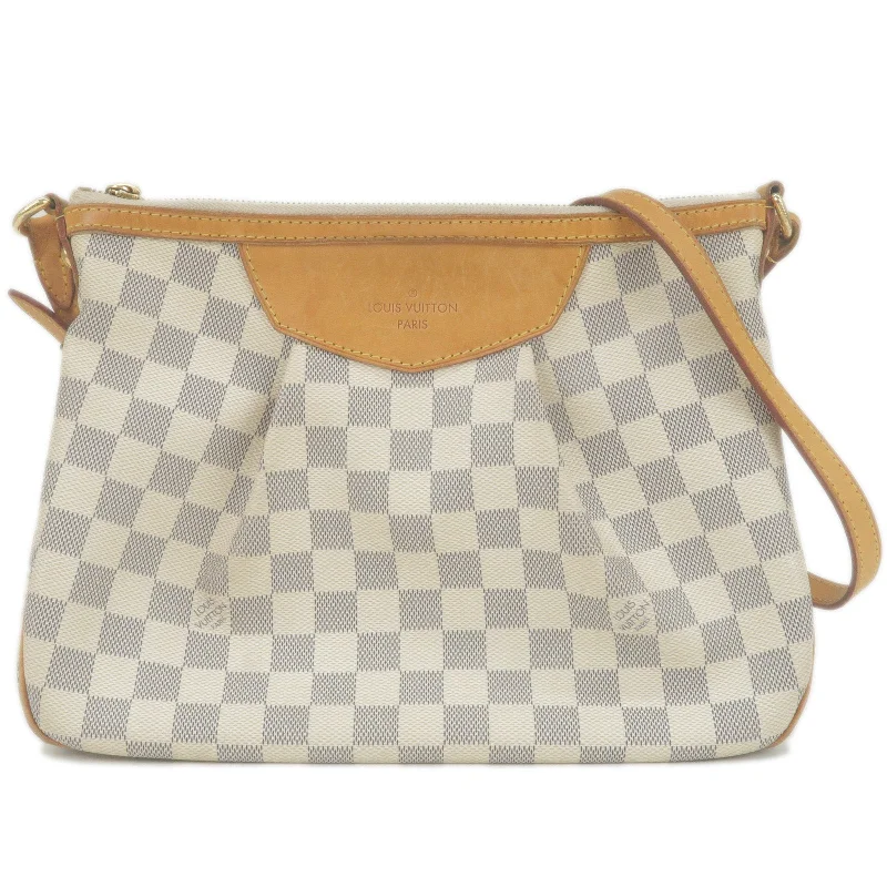 Louis Vuitton Twist bags with a crystal - embellished LV - turnlockLouis Vuitton Damier Azur Siracusa PM Shoulder Bag N41113