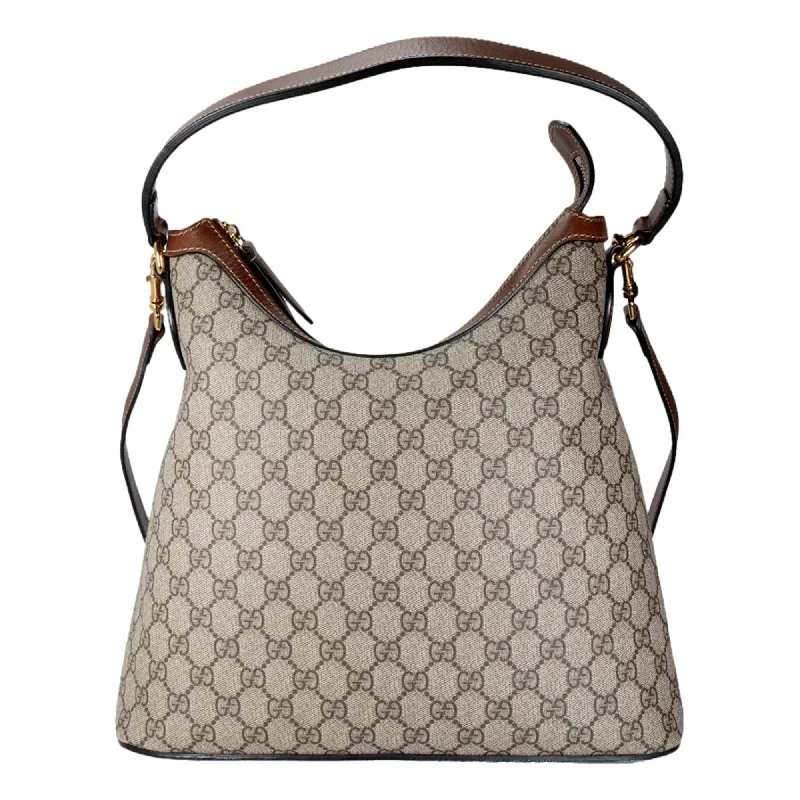 Gucci handbags for women with a patent - leather finishGucci handbags for women with a patent - leather finishGucci GG Logo Supreme Moon Beige Hobo Handbag