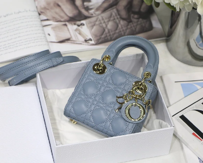 Christian Dior handbags with a snap - button closure and a decorative buckleChristian Dior - Luxury Bags  730