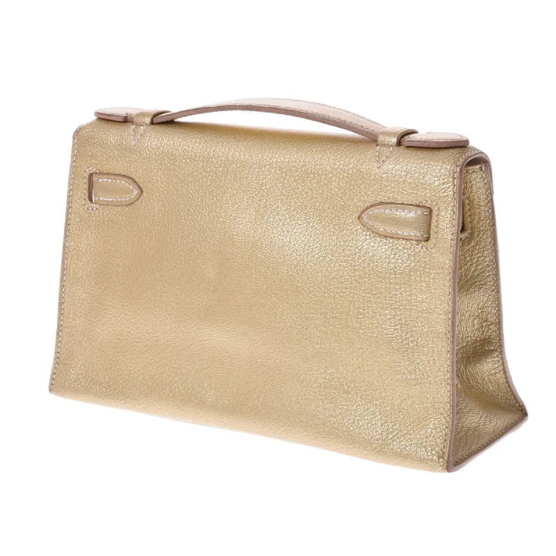 Hermes Pochette Kelly Metallic Gold  I Engraved (around 2005) Ladies Goat Chevre Handbag