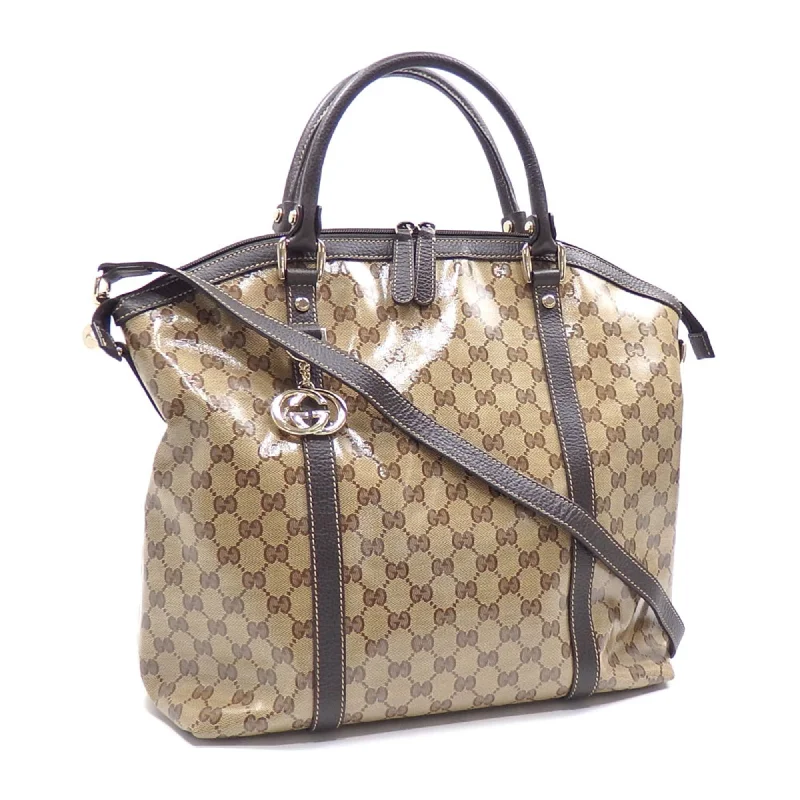 Women Gucci bags with a snap - button closure and a decorative charmWomen Gucci bags with a snap - button closure and a decorative charmGUCCI Handbag GG Crystal Beige Brown Coated Canvas Leather 339551 493075 Women Men